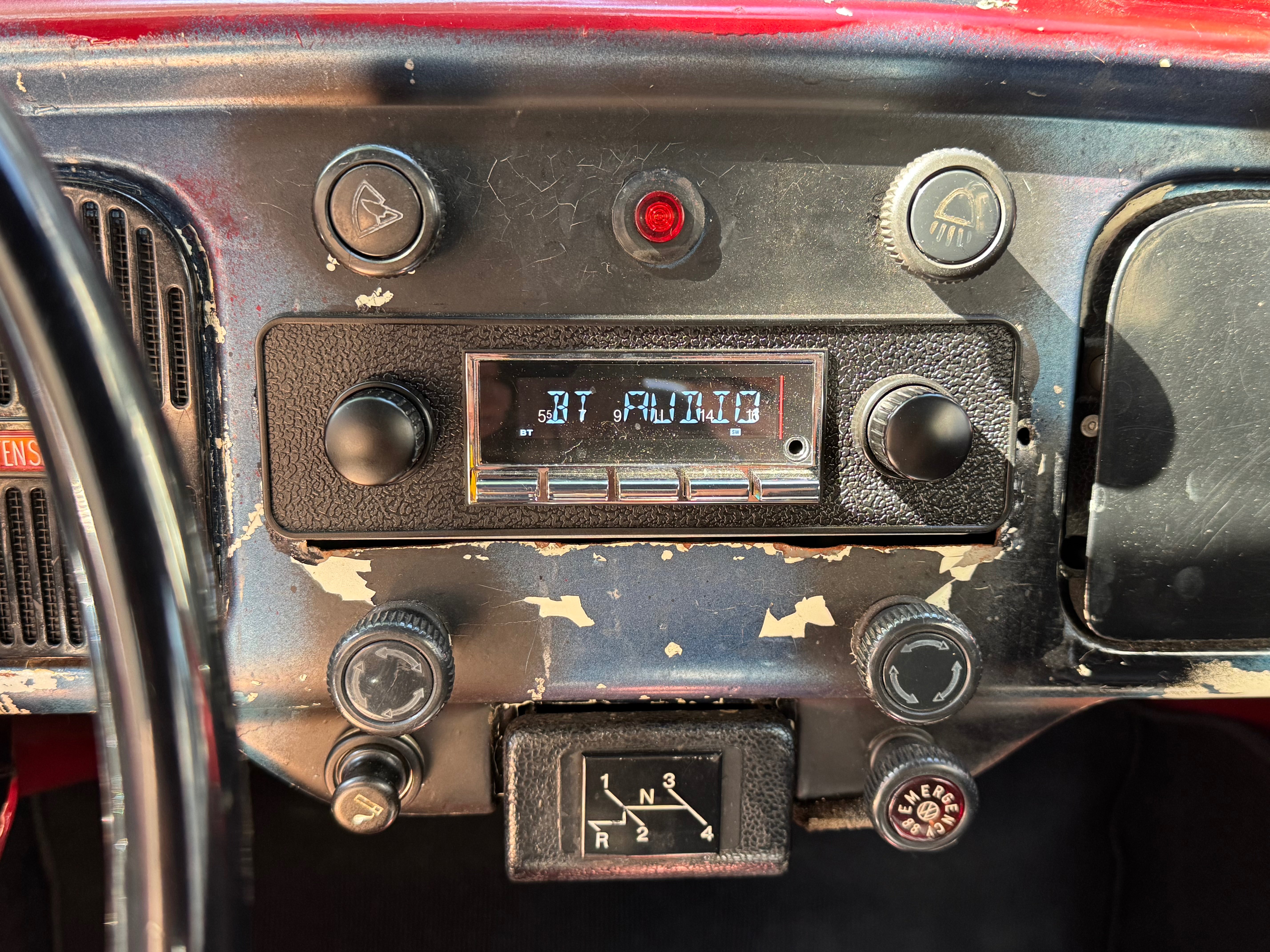 Dashboard with vintage Bluetooth radio and classic gauges